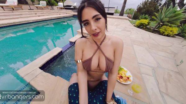 Busty Brunette Tru Kait gives a blowjob in the outdoor pool on pornoboobs.com