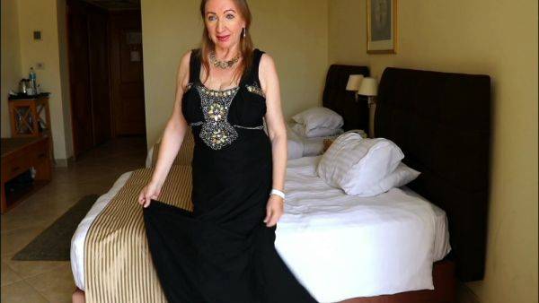Elegant Intrigue: Busty Gilf Mariaolds Black Dress And Stockings Mystery on pornoboobs.com